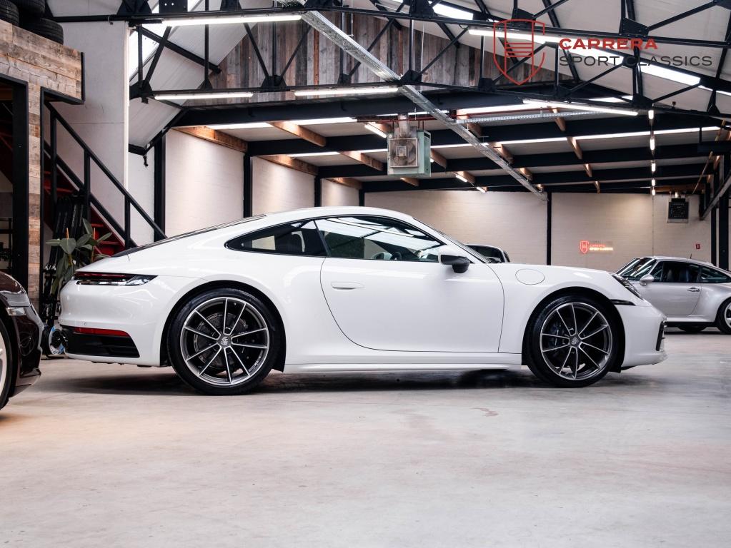 Porsche 911 992 Carrera Coupé 3.0 Carrera / Sport design /, Automaat, 4 zetels, Gebruikt, Zwart