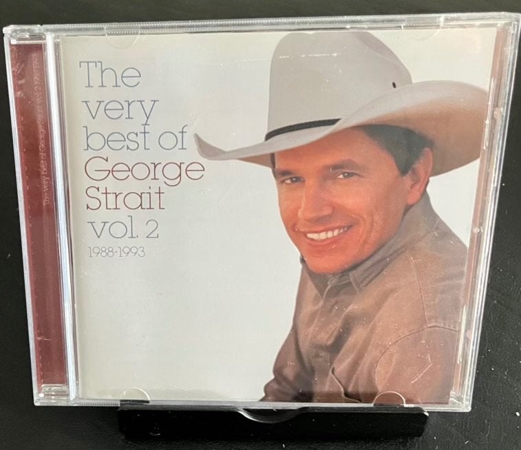 George Strait - The Very Best Of Volume 1 & 2, CD & DVD, CD | Country & Western, Enlèvement, Comme neuf, Compilation, Comprend un livret