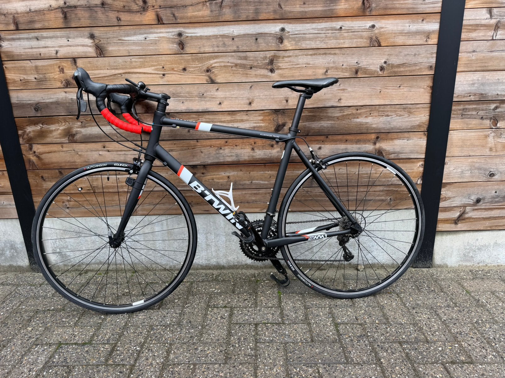 Racefiets Btwin Triban 500, Fietsen en Brommers, Ophalen, Zo goed als nieuw