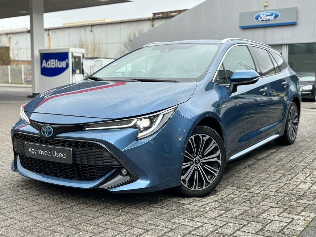 Toyota Corolla Touring Sport 1.8 VVT-I Hybride Style, Auto's, Stof, 4 cilinders, Blauw, Corolla