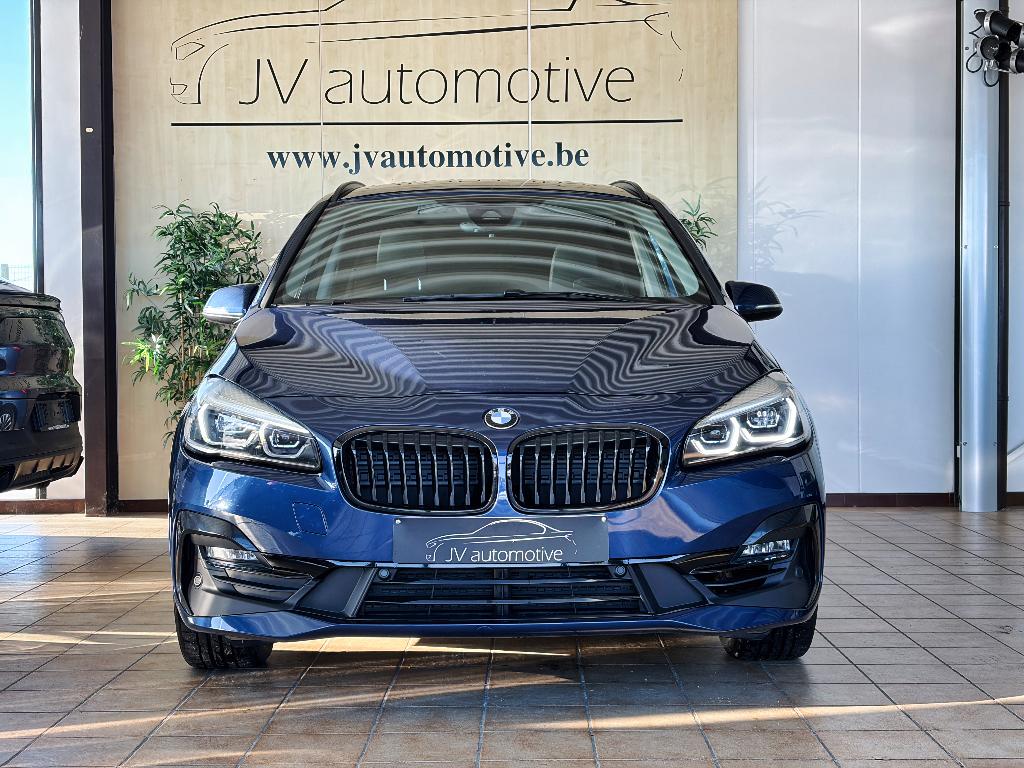 BMW 216i Gran Tourer - 2021 - 99.381km - Leder - Camera, Auto's, BMW, Voorwielaandrijving, Blauw, Leder, 3 cilinders