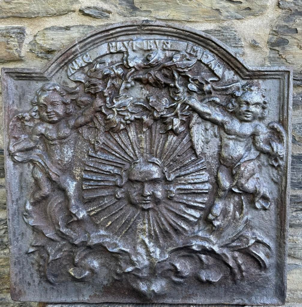 Plaque de cheminée en fonte roi soleil rayonnant, Enlèvement