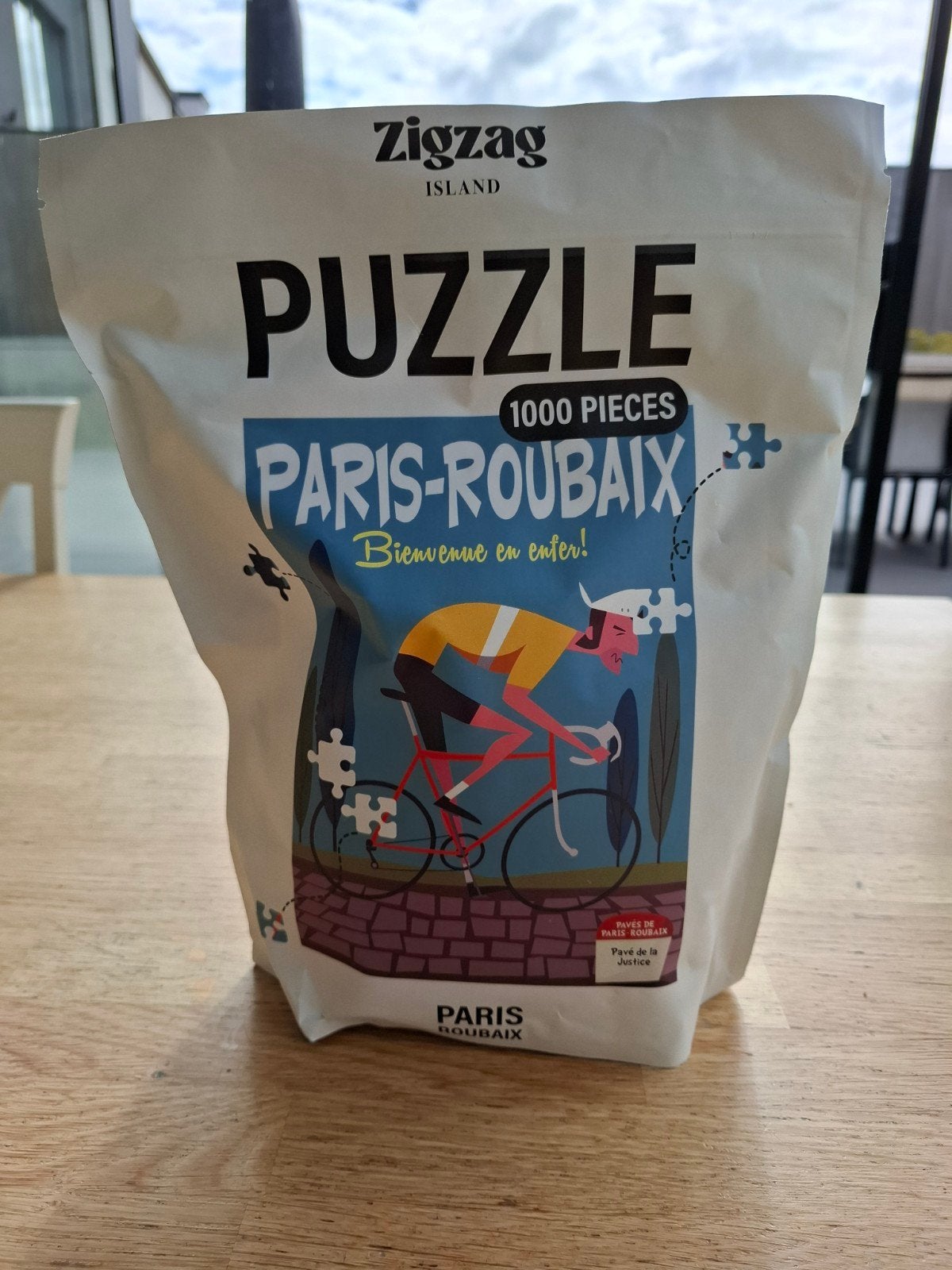 Puzzle limité Zigzag Island Paris-Roubaix, Enlèvement ou Envoi, 500 à 1500 pièces, Neuf