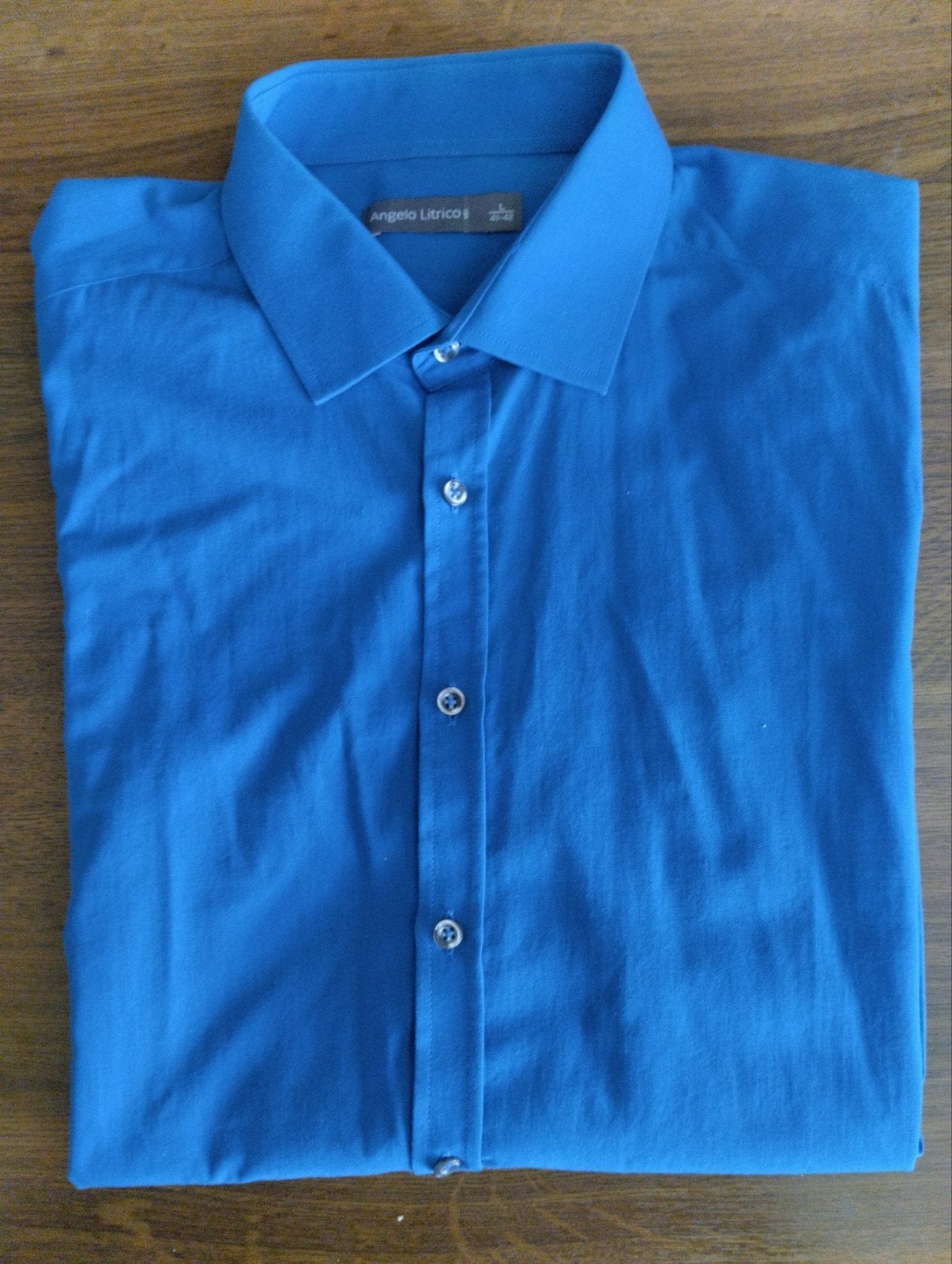 1 heren lange mouw, blauw maat 41-42 (L)
Angelo Litrico., Enlèvement ou Envoi, Bleu
