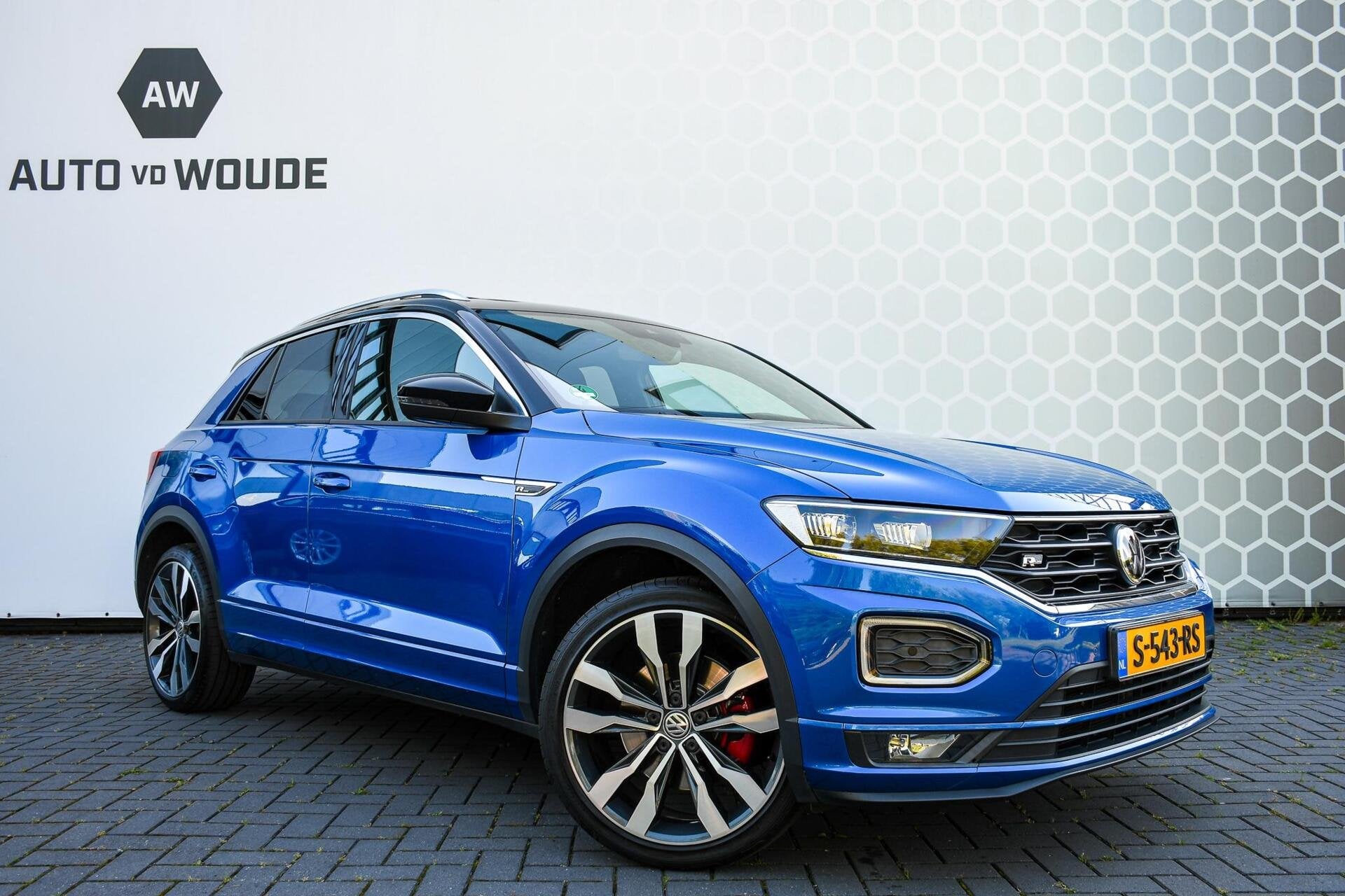 Volkswagen T-Roc 1.5 TSI Sport Business 3X R-line Pano Virtu, Auto's, Stof, 4 cilinders, Blauw, 127 g/km