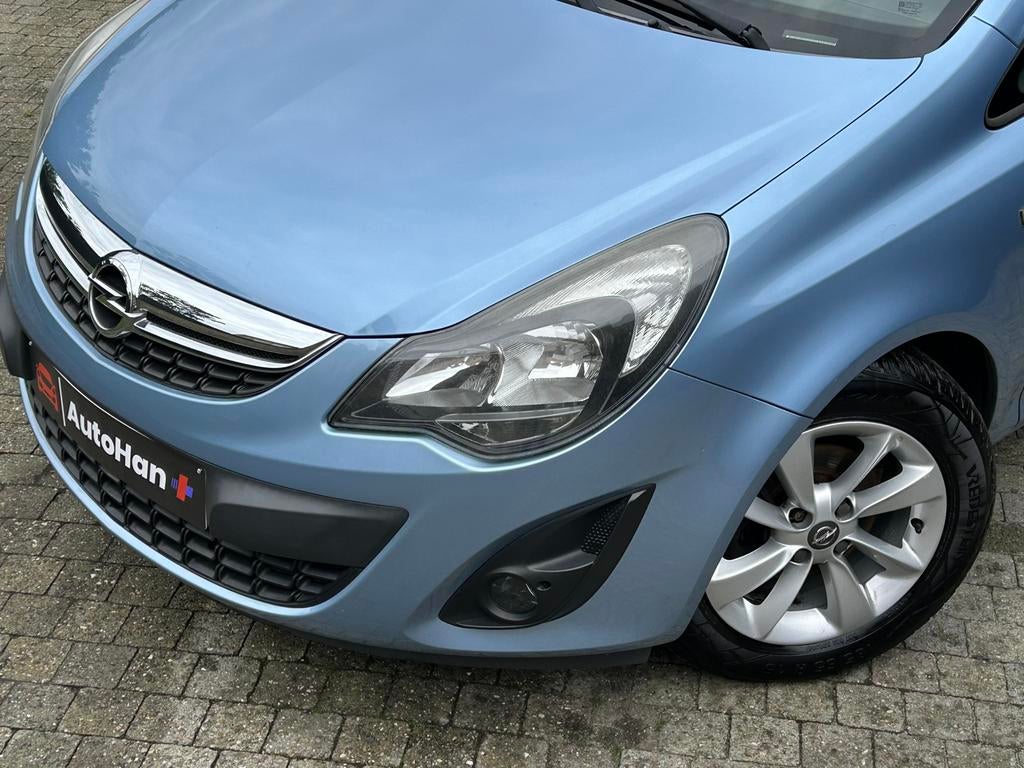 Opel Corsa 1.2 Edition Airco Navigatie Cruise Onderhoudsboek, Auto's, Voorwielaandrijving, Euro 5, 4 cilinders, Blauw