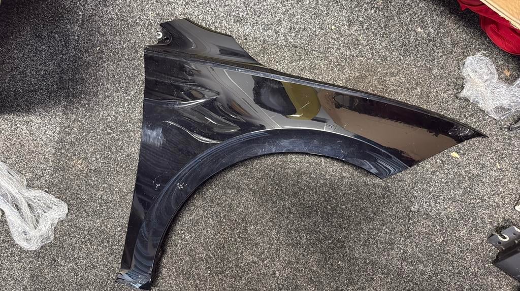 Volkswagen Polo 2G Spatbord Zijscherm zwart, Ophalen, Volkswagen, Spatbord