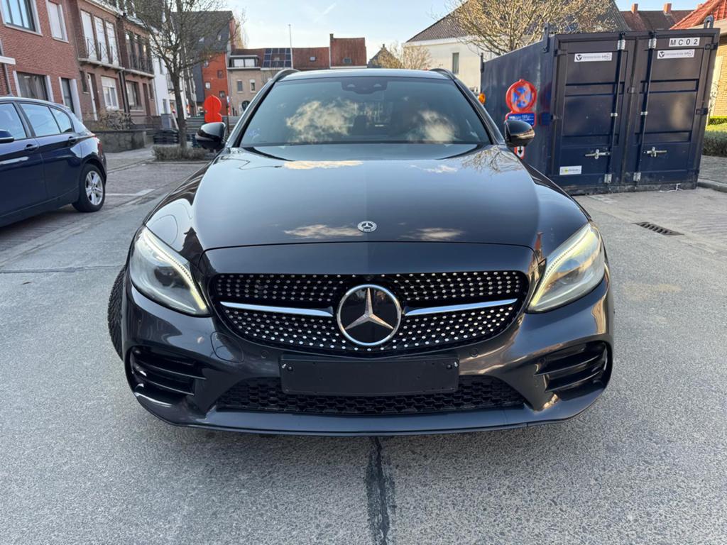 Mercedes c300 de diesel hybrid AMG Line Full option, Auto's, Mercedes-Benz, Automaat, Achterwielaandrijving, Euro 6, Zwart