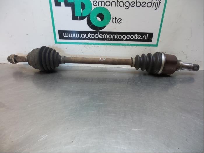 Arbre de transmission avant gauche d'un Citroen C2 (C2 03-), -, 3 mois de garantie, Utilisé, -