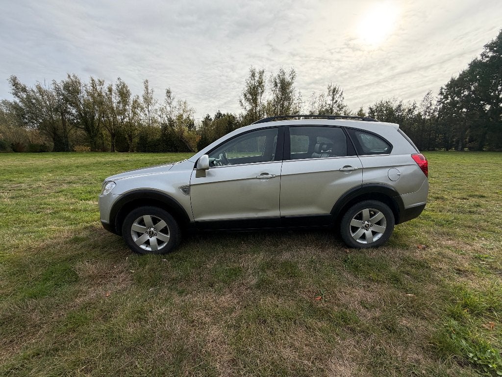 Chevrolet Captiva 2.0TD 4x4 7zits 1ste eigenaar 129.000km, Auto's, 197 g/km, 4 cilinders, 2000 kg, Leder en Stof