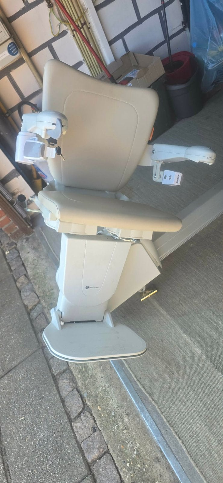 Handicare traplift met rechte rail – bouwjaar 2024, Divers, Monte-escaliers, Enlèvement, Comme neuf