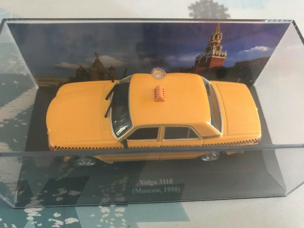 VOLGA Taxi Jaune Moscou Jason Bourne 1/43 IXO UH NEUF+BOITE, Enlèvement, Neuf, Voiture, Universal Hobbies