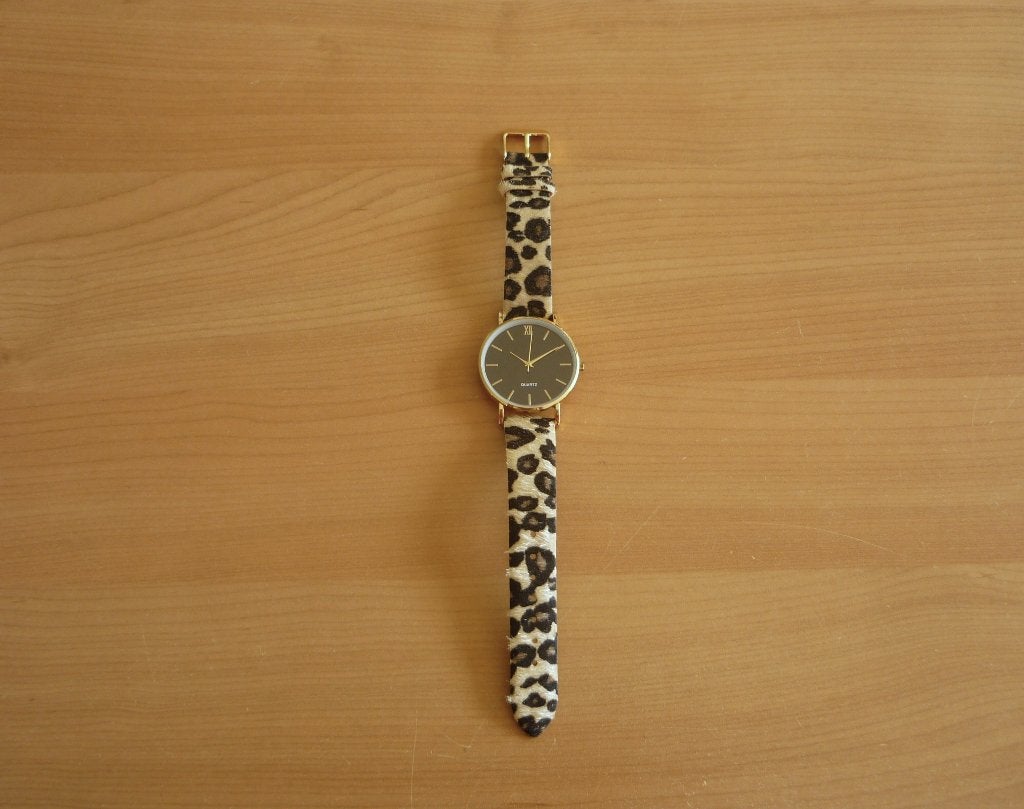 Goudkleurig zwart horloge met jaguarmotief horlogebandje, Ophalen of Verzenden, Zwart
