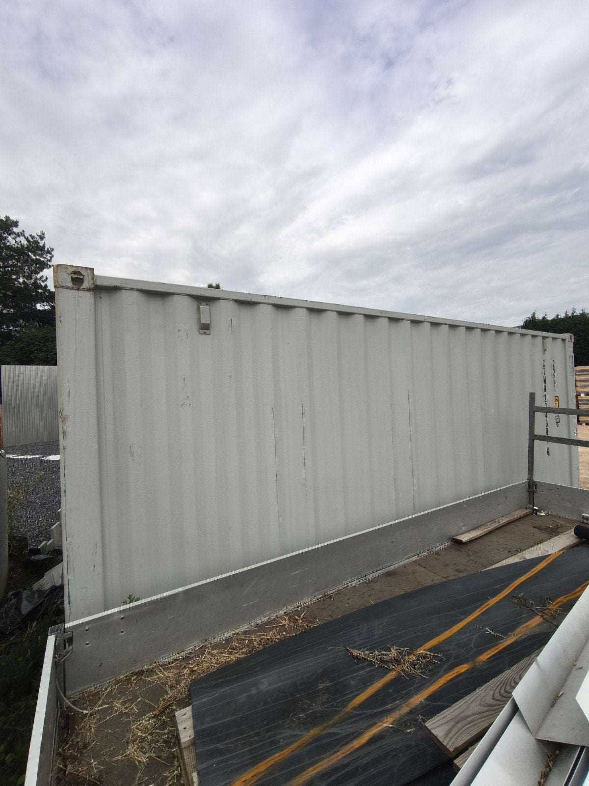 container 20 pieds gris, Ophalen