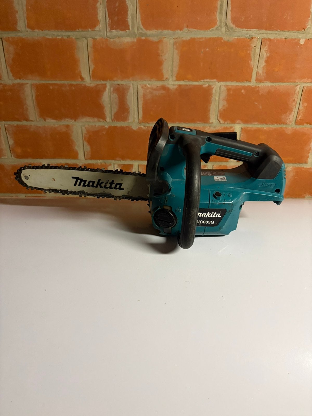 Makita XGT 40V kettingzaag UC003GZ 30cm, Ophalen of Verzenden, Gebruikt