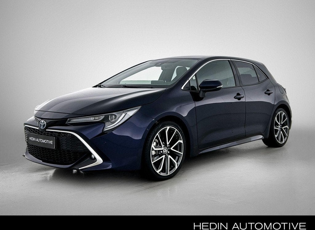 Toyota Corolla Hatchback 2.0 Hybrid Premium e-CVT, Auto's, Toyota, Gebruikt, 750 kg, 4 cilinders, Blauw