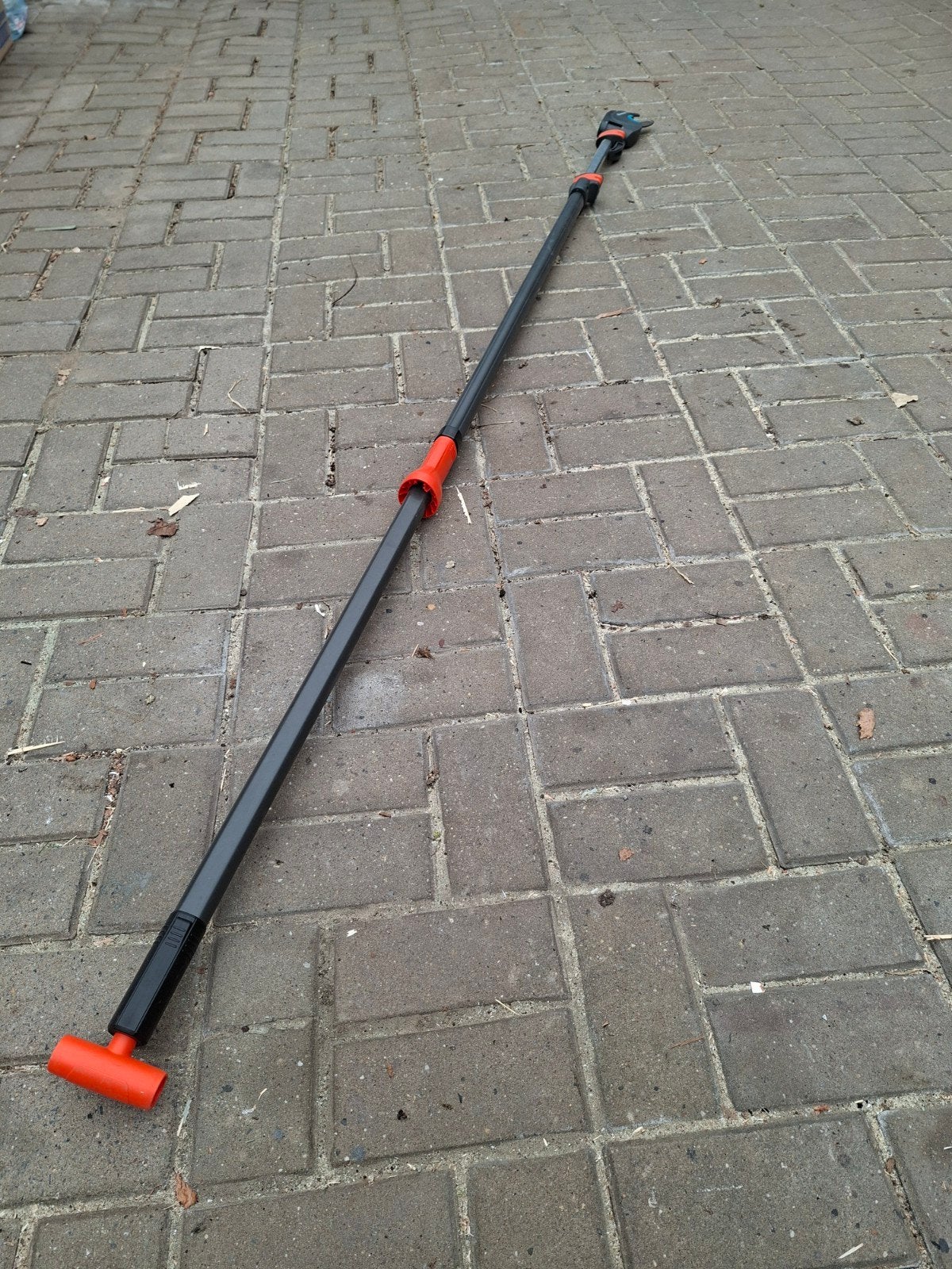 Telescopische takkenschaar, Ophalen
