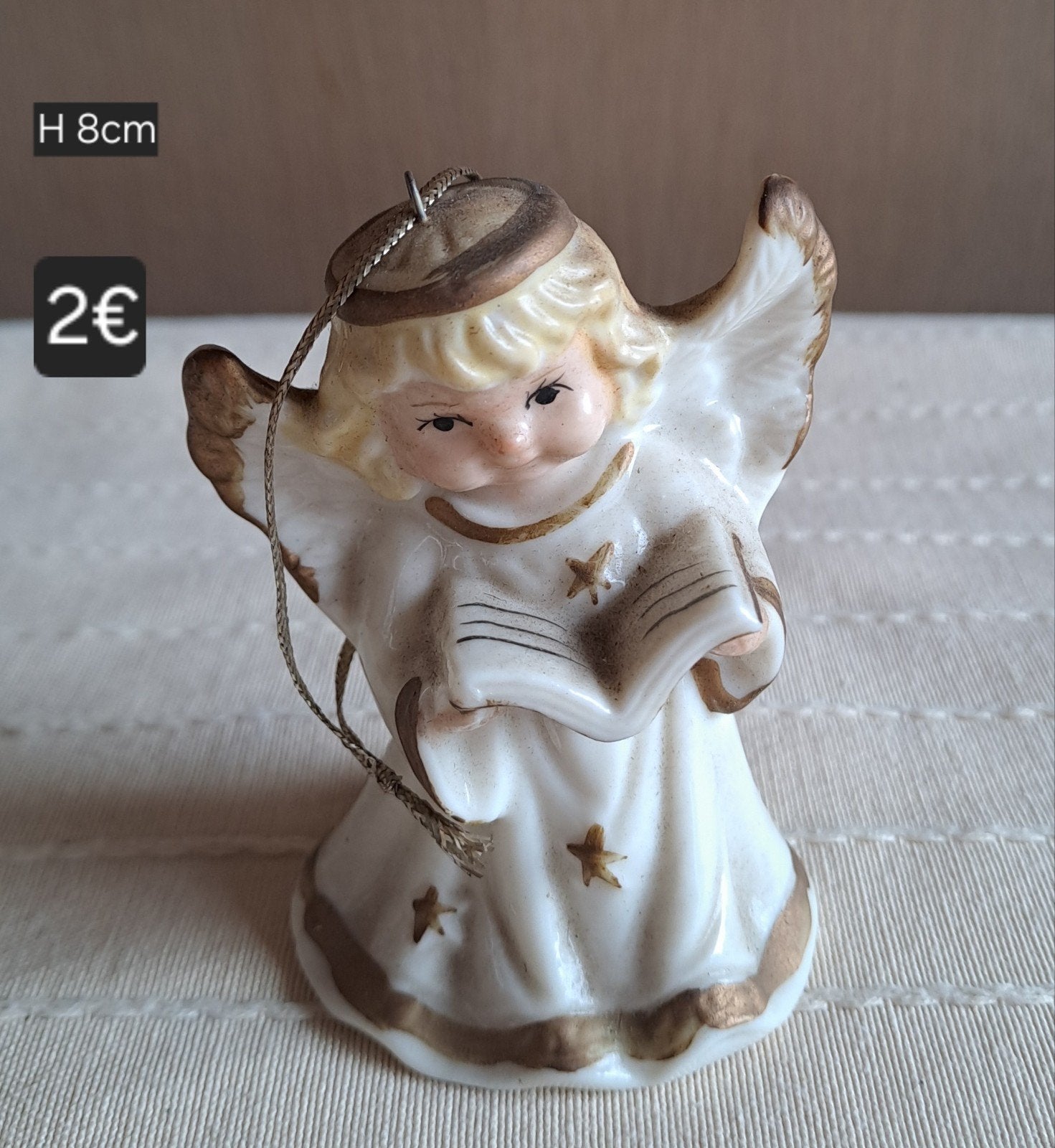 kerst engel belletje, Ophalen