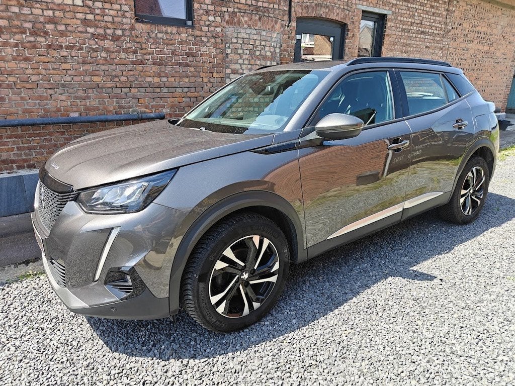 Peugeot 2008 Allure (bj 2020), Auto's, Voorwielaandrijving, Stof, Gebruikt, Euro 6