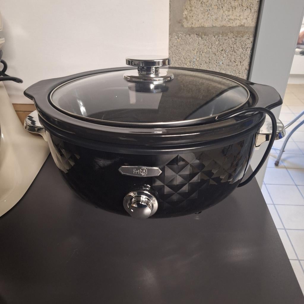 Slowcooker. Nieuwstaat., Enlèvement
