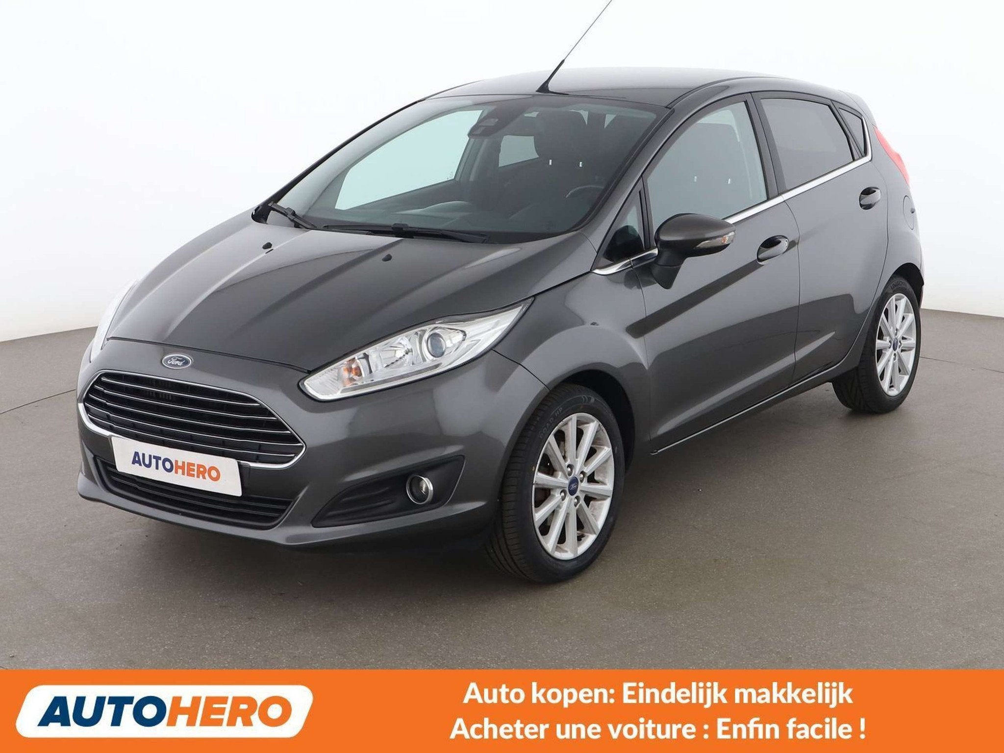 Ford Fiesta 1.0 EcoBoost Titanium (bj 2016), Auto's, Voorwielaandrijving, Euro 5, Stof, Gebruikt