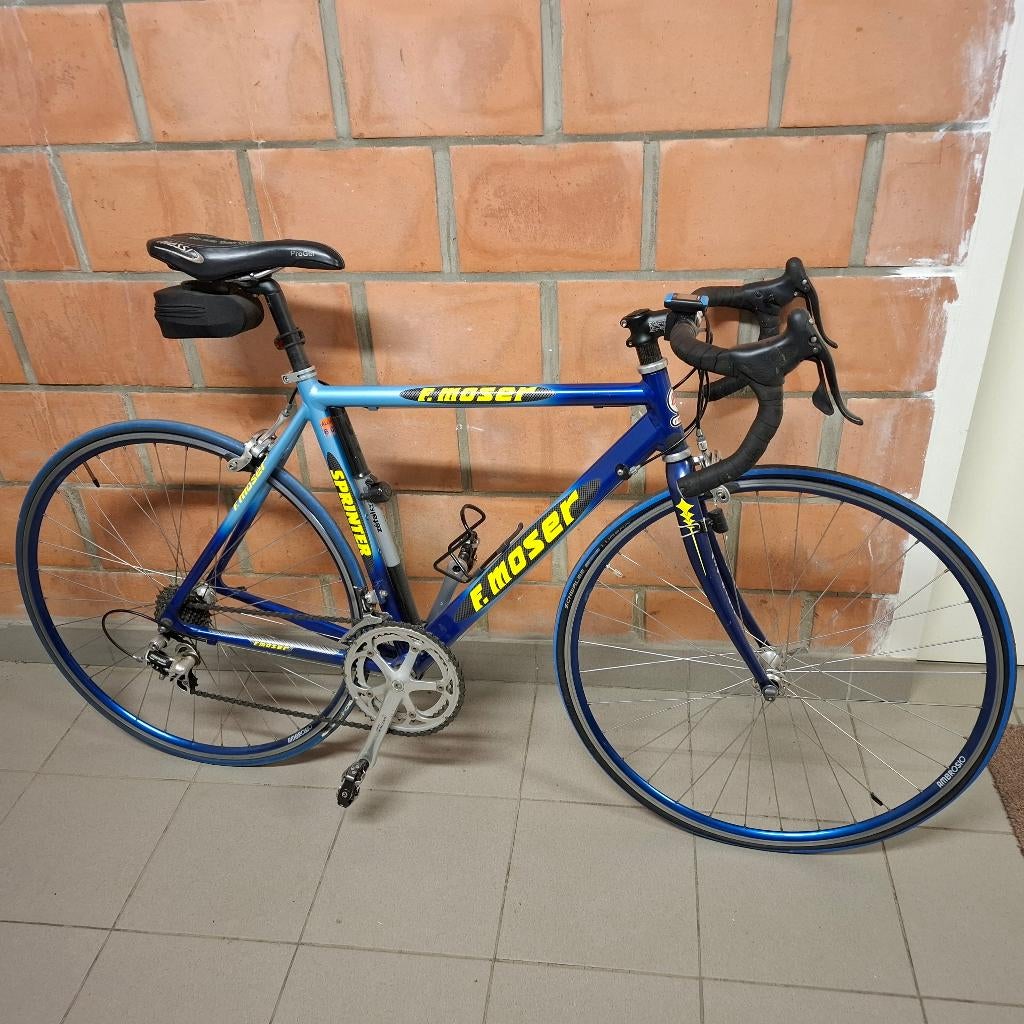koersfiets heren F. Moser + fietstrainer, Fietsen en Brommers, Fietsen | Heren | Sportfietsen en Toerfietsen, Zo goed als nieuw