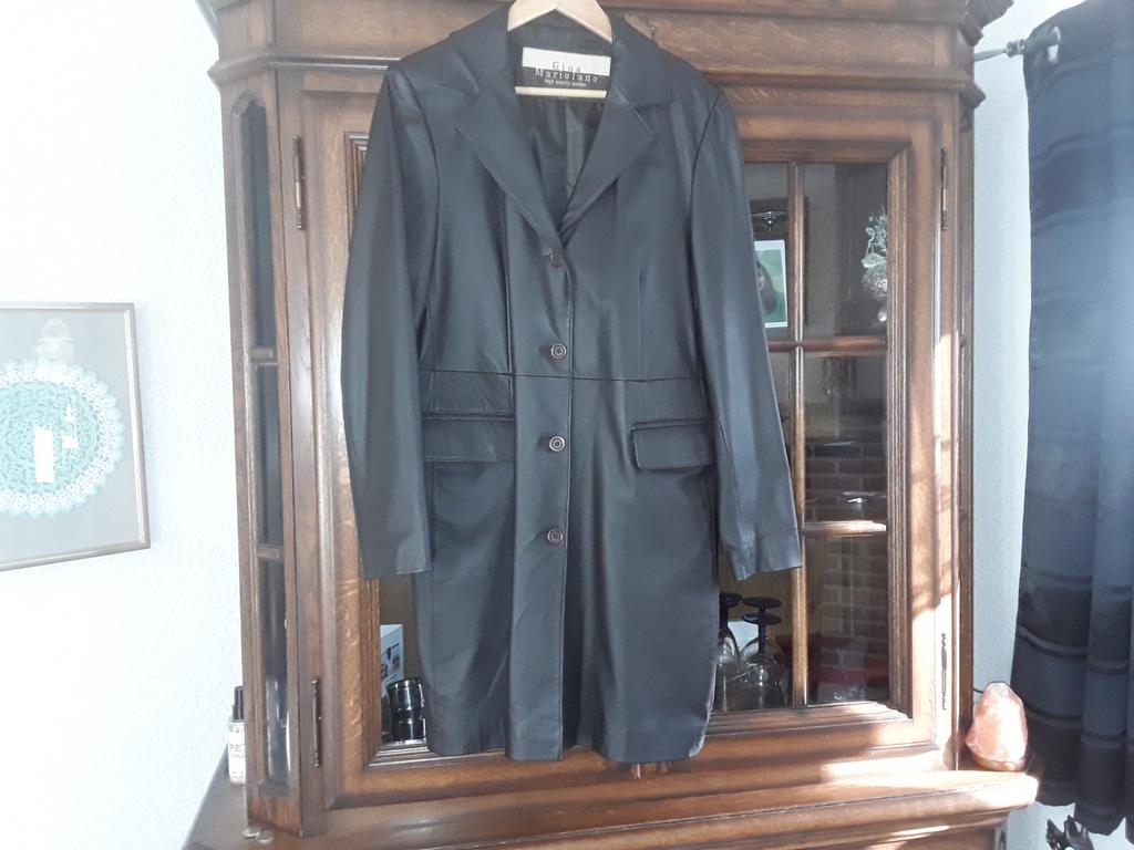 Manteau cuir véritable, Ophalen