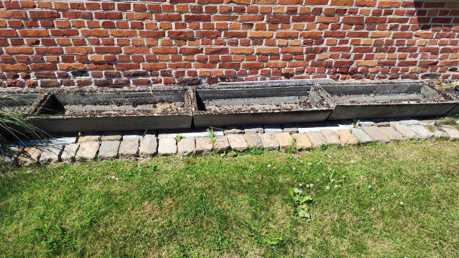 Betonnen bloembakken / plantenbakken, Ophalen