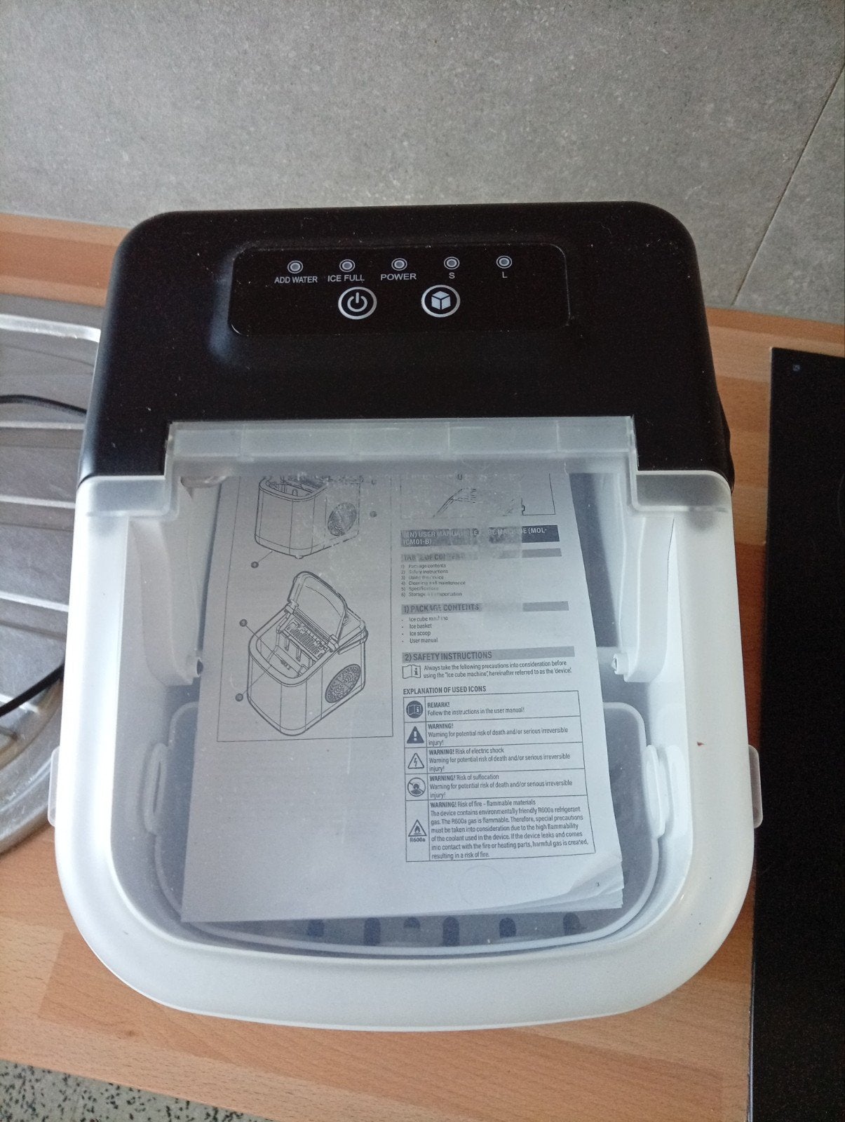 ijsblokjes machine, Ophalen