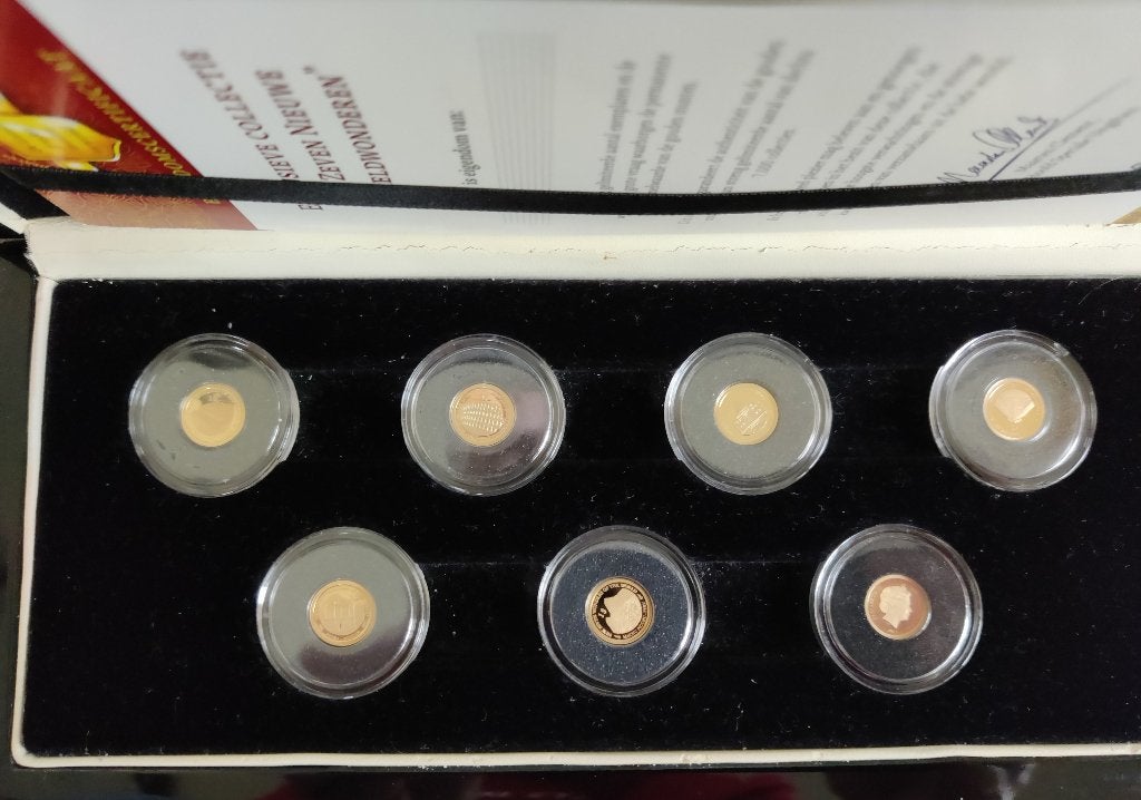 Zeven wereldwonderen collectie - munten - 14 karaat goud, Ophalen of Verzenden, Overige landen, Setje, Goud