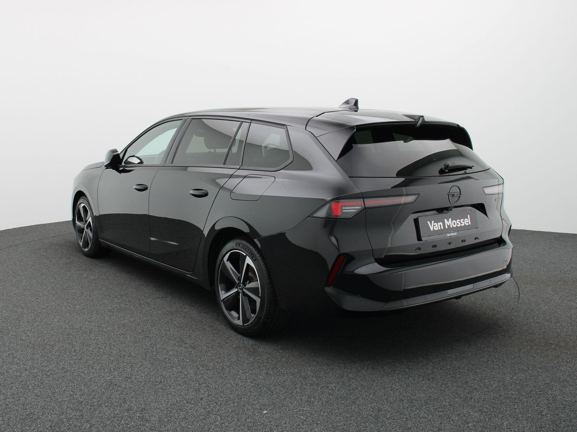 Opel Astra Sports Tourer 1.6 Turbo Hybrid 132kW GS STUUR- EN, Auto's, Apple Carplay, Stof, 4 cilinders, Zwart