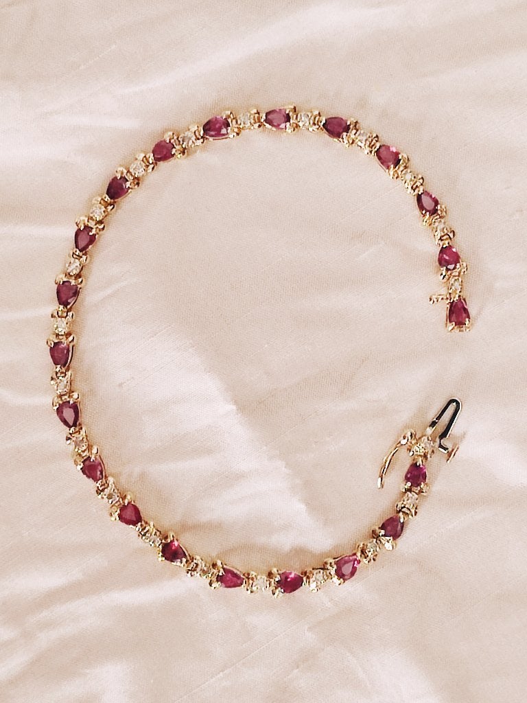 Goude armband met natuurlijke robijnen en diamanten, Handtassen en Accessoires, Ophalen of Verzenden, Zo goed als nieuw, Met edelsteen
