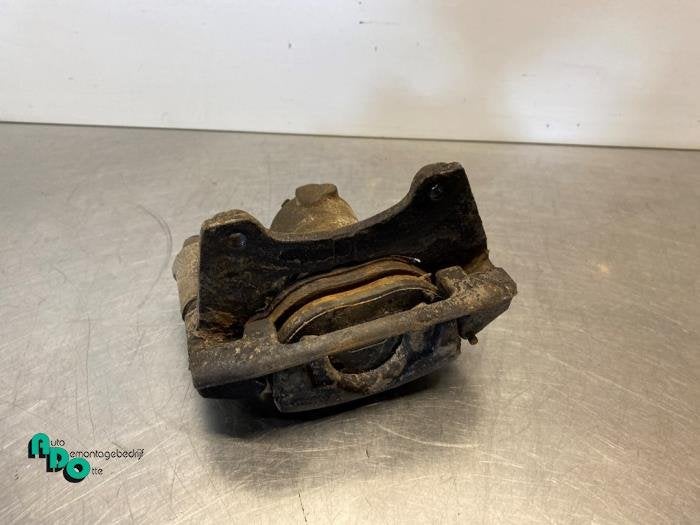 Etrier de frein (pince) avant gauche d'un Fiat 500 (500 07-), -, 3 mois de garantie, Utilisé, Fiat