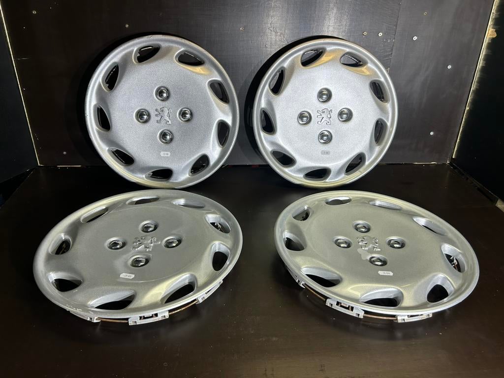 4 originele wieldoppen Peugeot 206.207, 306 partner 14", Ophalen of Verzenden, Zo goed als nieuw