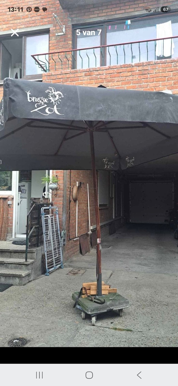 Groote horeca parasol Brugse Zot, Enlèvement