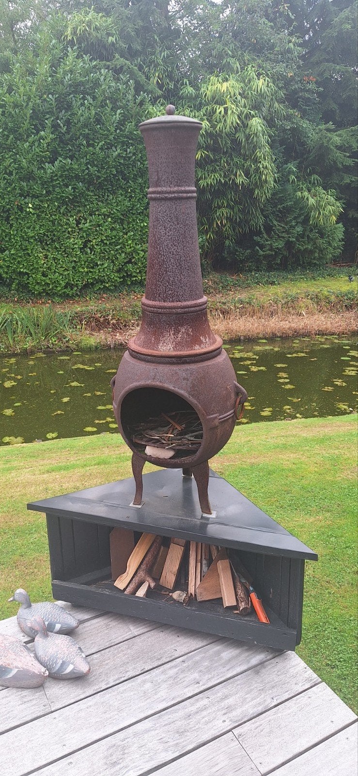 buitenhoutkachel in gietijzer, Ophalen