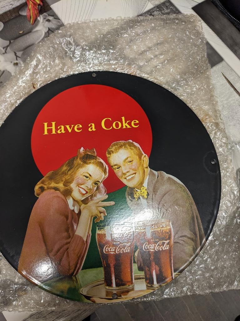 Plaque émaillée coca cola, Enlèvement
