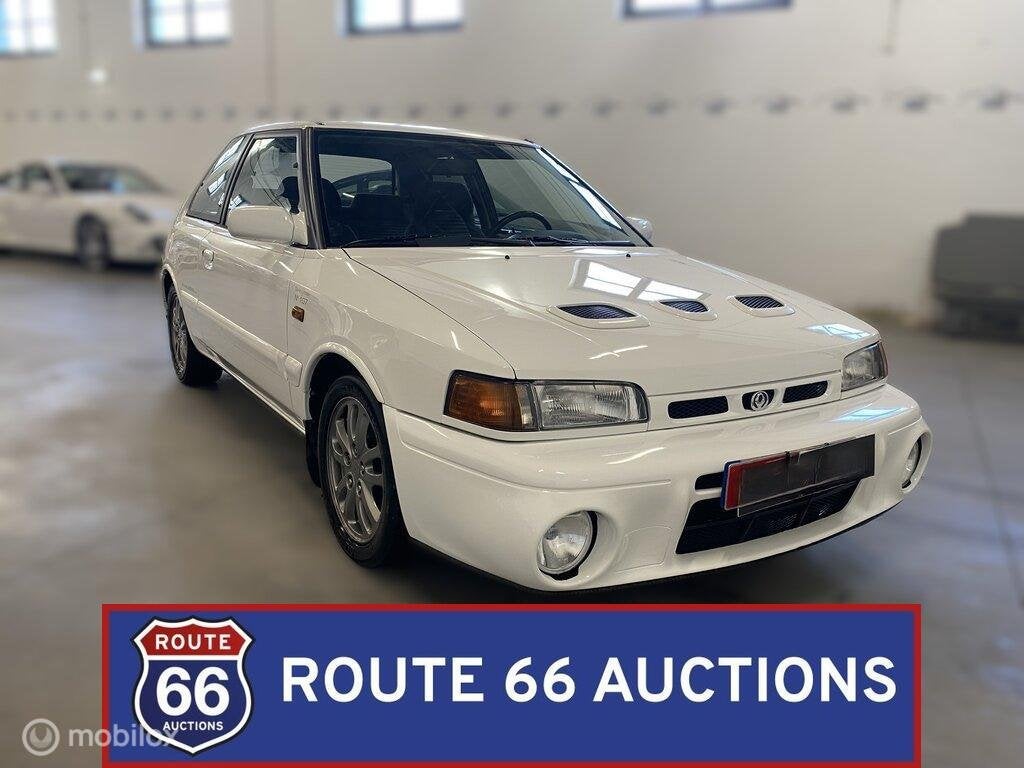 Mazda 323 GT-R | 1992 | Route 66 Auctions, Auto's, Zwart, Bedrijf, Handgeschakeld, Overige carrosserie