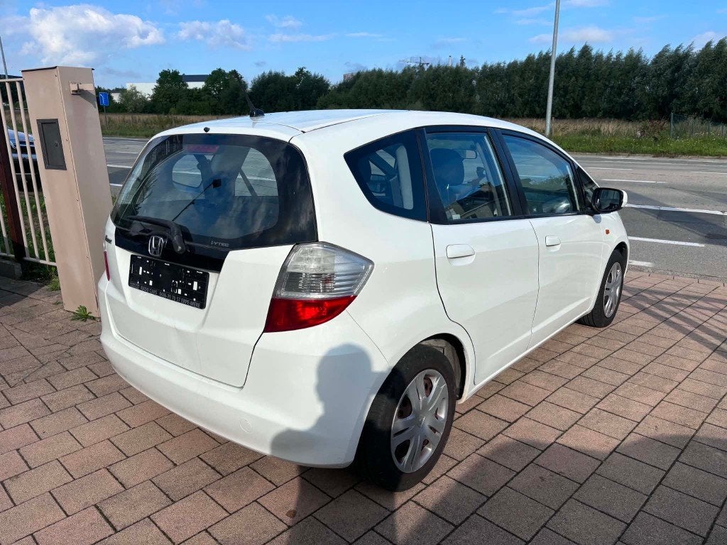 Honda jazz benzine van 2009, https://public.car-pass.be/vhr/d2f18b8d-df6b-4980-bfc7-b801c45ecb5c, Wit, Bedrijf, Airbags
