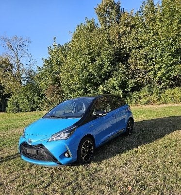 TOYOTA YARIS HYBRID - UNIEK TYPE - BITONE-EDITIE, Auto's, 1497 cc, 4 cilinders, Blauw, Leder