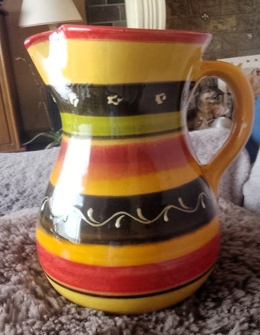 waterkan / wijnkan (4 €), Ophalen