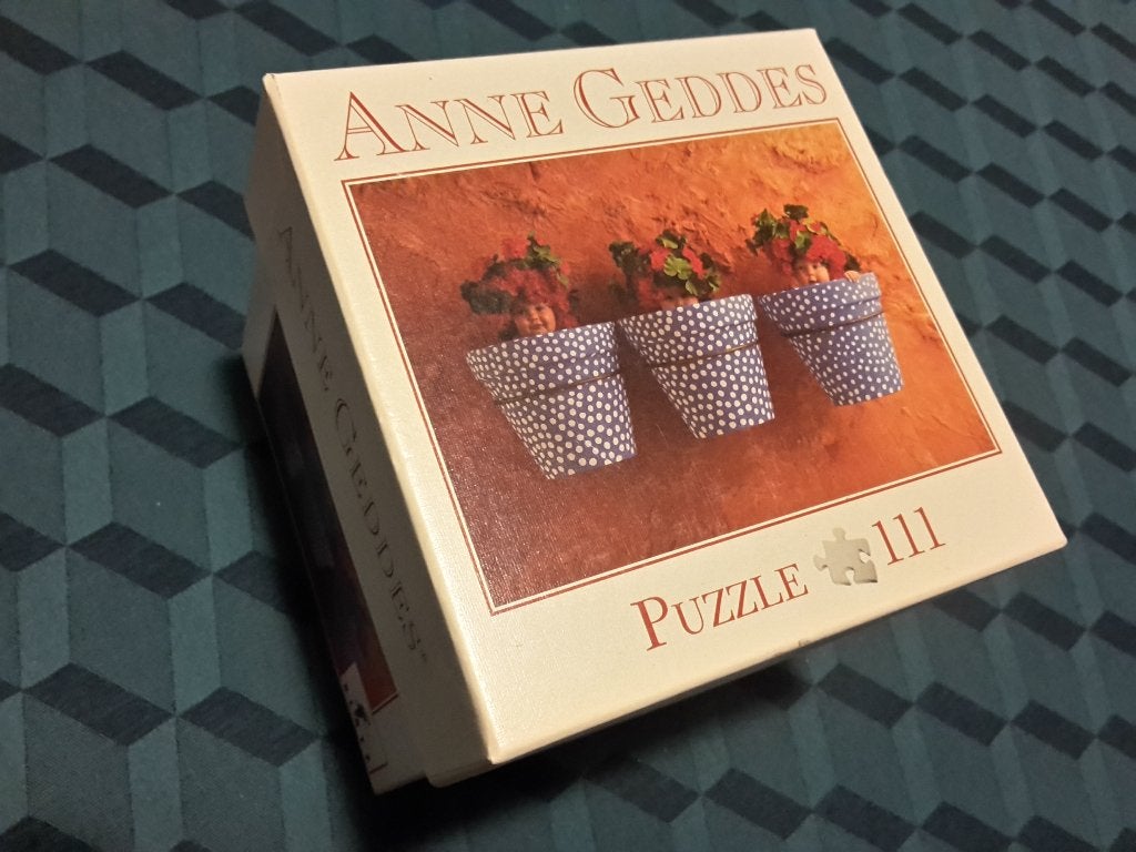 Kleine Anne Geddes puzzle in doosje, als nieuw, 111 stukjes, Ophalen of Verzenden, Minder dan 500 stukjes, Zo goed als nieuw, Legpuzzel