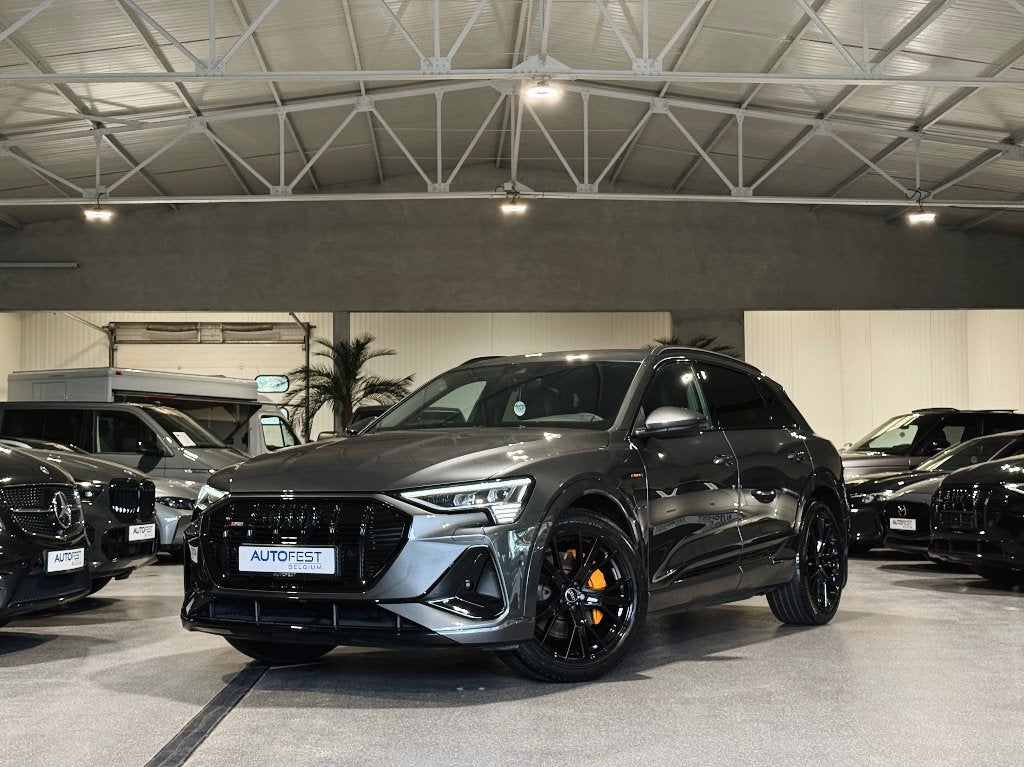 Audi E-Tron 55 Quattro S-Line Daytona Grijs - Garantie, Auto's, Automaat, Leder, SUV of Terreinwagen, Zilver of Grijs