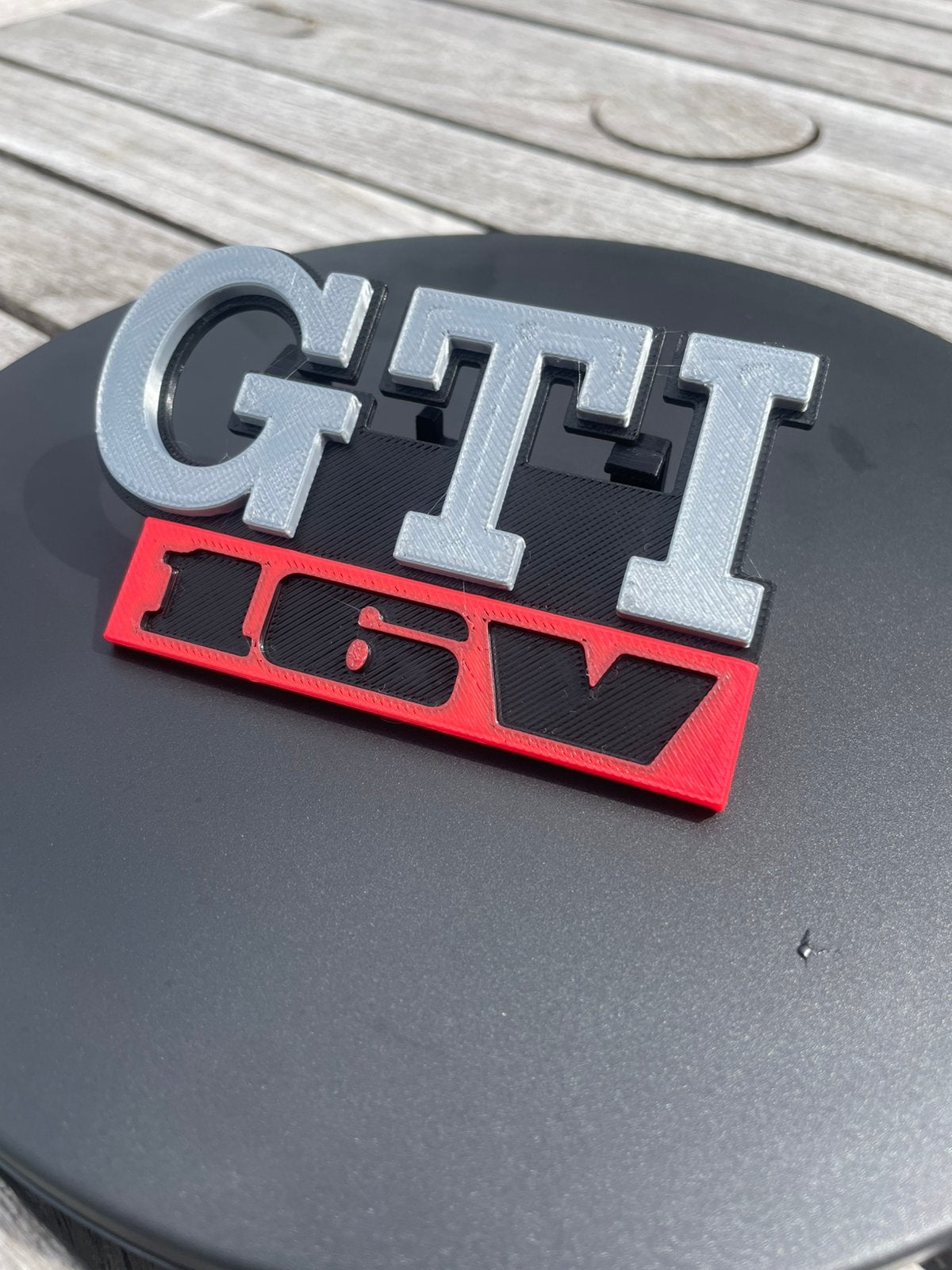 Gti 16v embleem, Ophalen