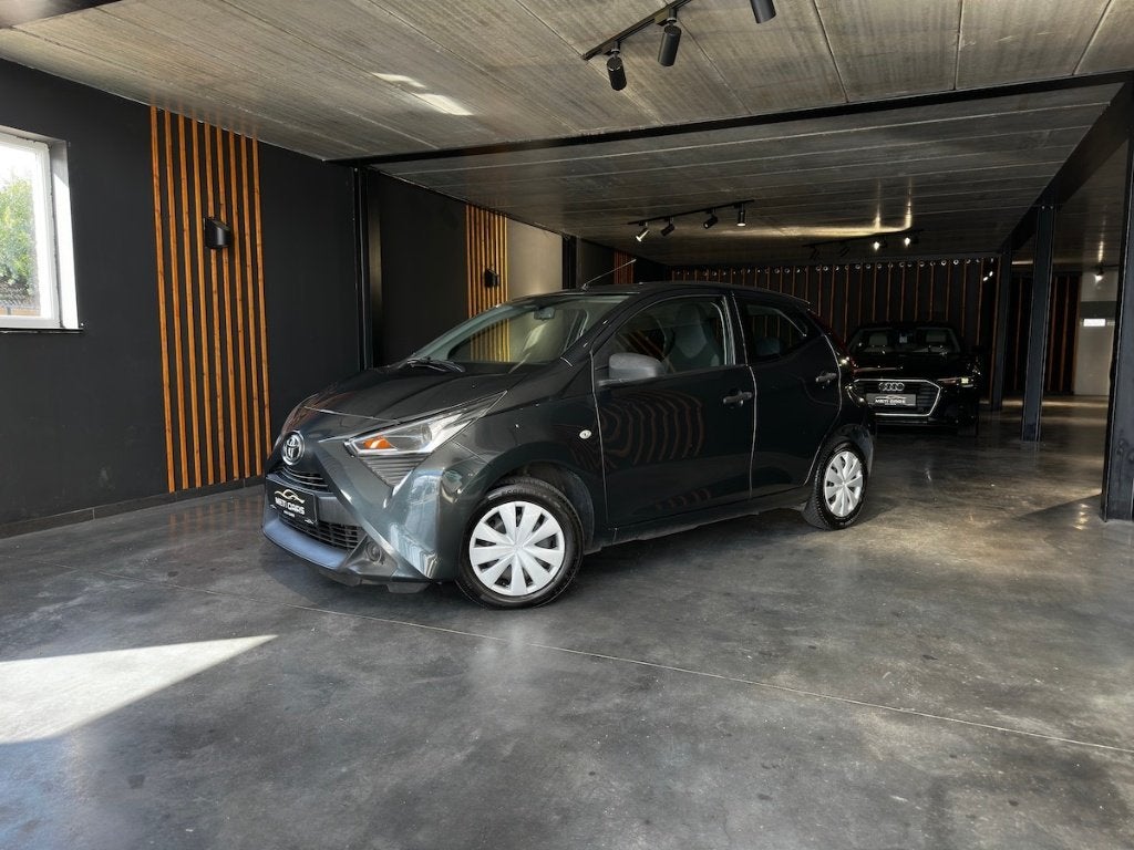 Toyota Aygo 1.0i VVT-i | A/C | Cruise | Radio | BT | ..., Auto's, Voorwielaandrijving, Stof, Xenon verlichting, 5 deurs
