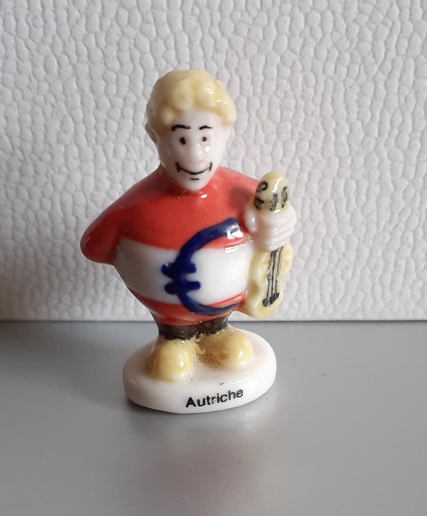 feve en porcelaine theme pays l'autriche, Enlèvement ou Envoi, Comme neuf, Autres types