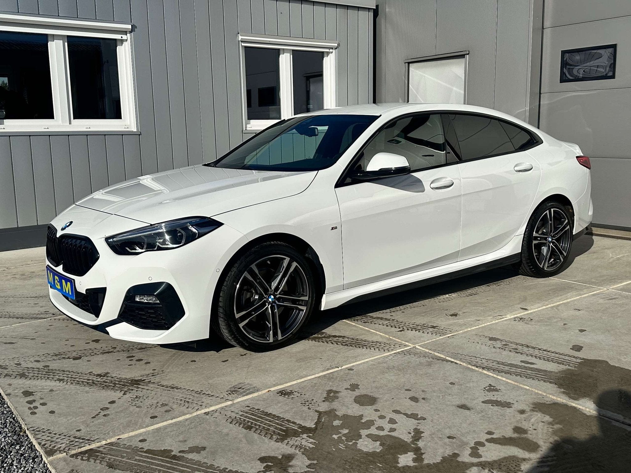 BMW 218 Gran Coupé 218iA * M-Pakket * 12M Garantie *, Auto's, Automaat, Gebruikt, Zwart, Wit