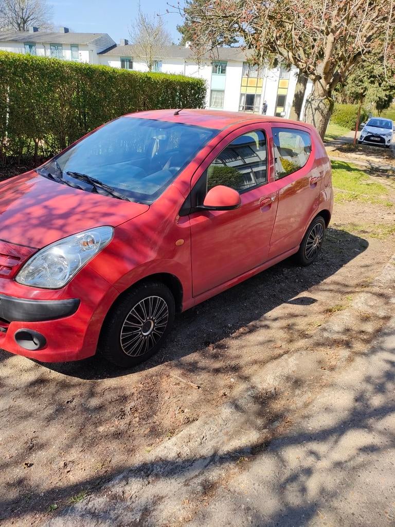 Nissan Pixo 2010 avec airco, Autos, Rouge, Euro 5, Achat, 50 kW