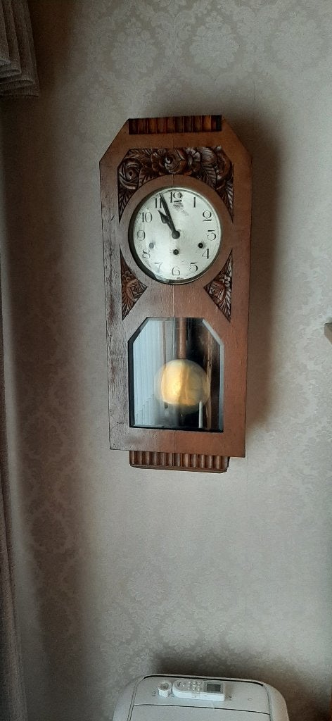 antieke hangklok, Ophalen