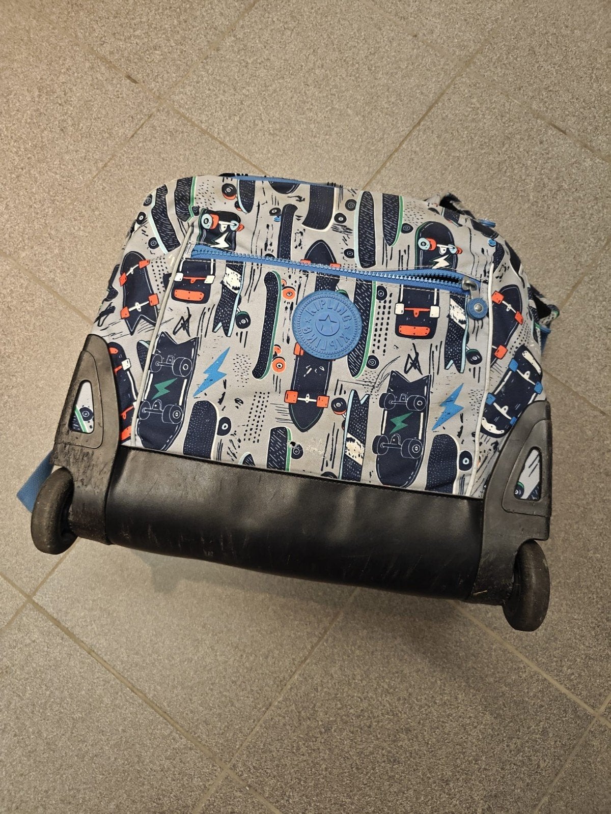 Boekentas jongen kipling, Ophalen